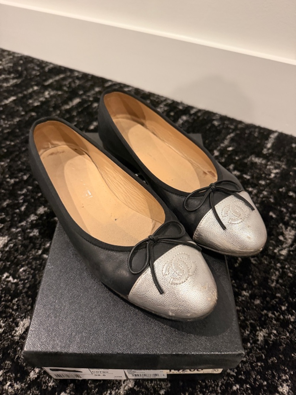 CHANEL Black Leather Ballet Flats with Silver Cap Toe